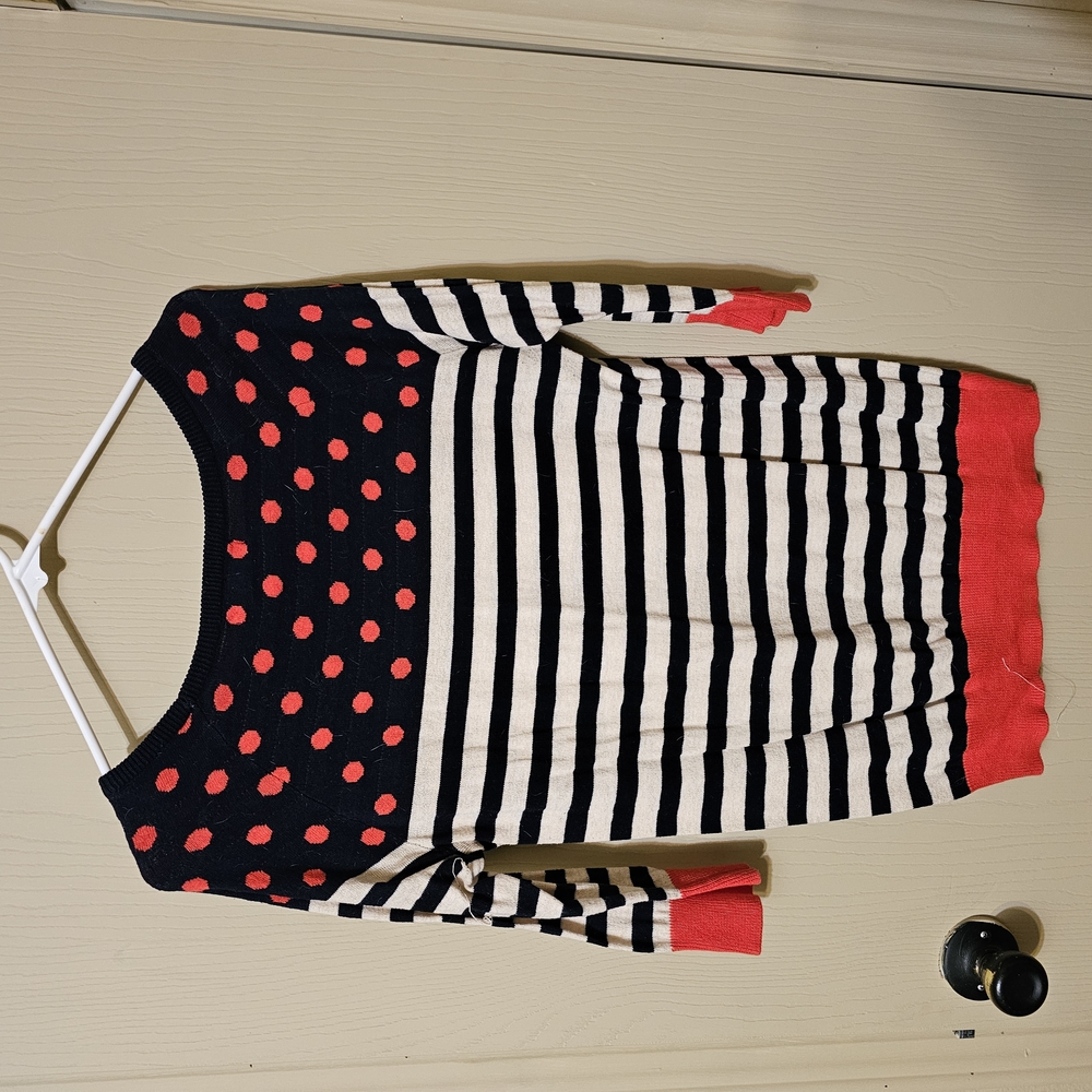 Black and White Striped Sweater with Red Accents